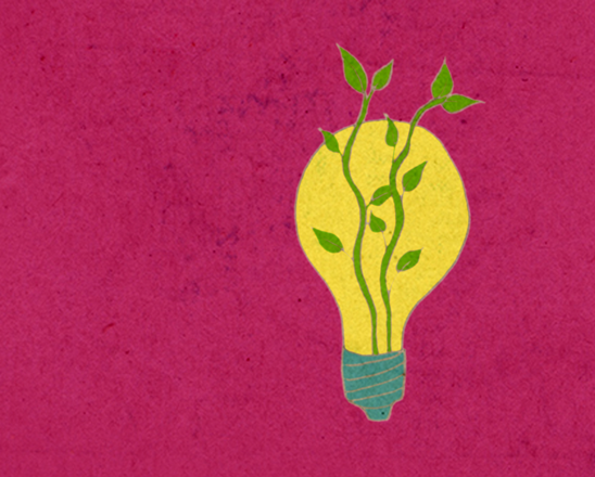 Sustainable Ideas - light bulb with nature growing around it